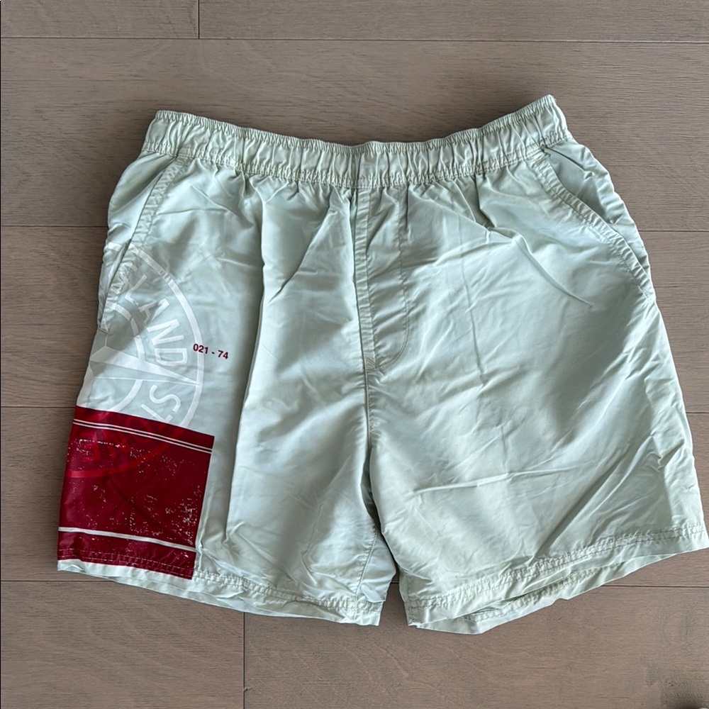 Stone Island Light Gray Shorts with Red Graphic